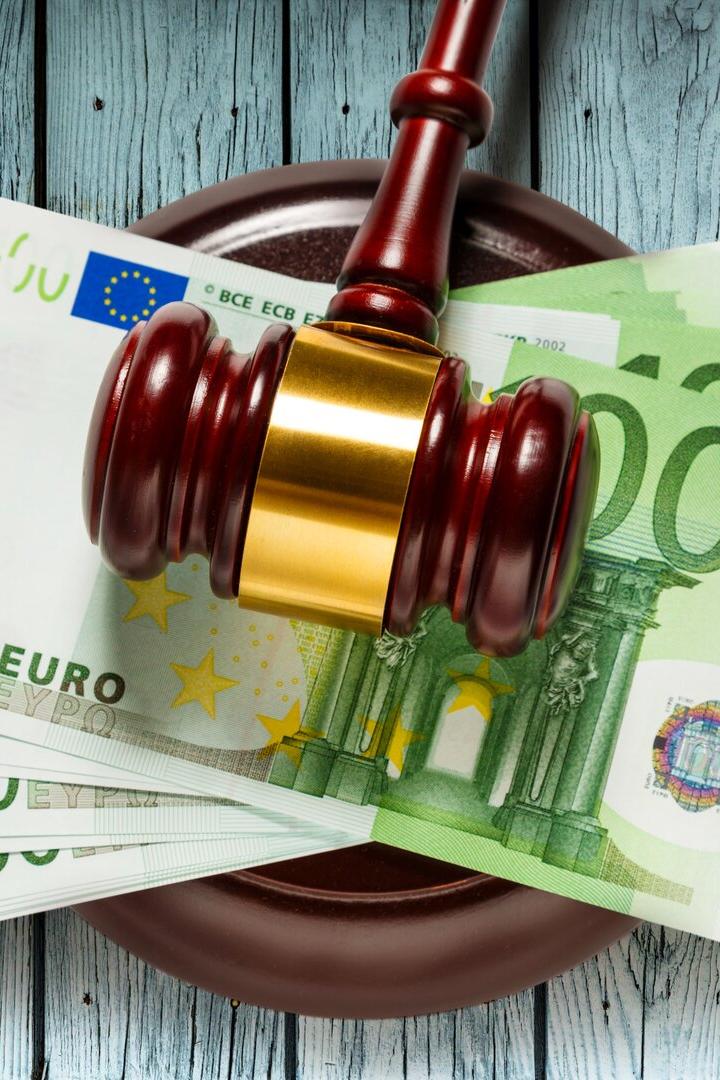 Judge's gavel and one hundred euro banknotes