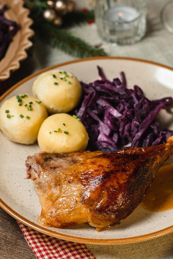 Delicious roast duck with red cabbage and dumplings