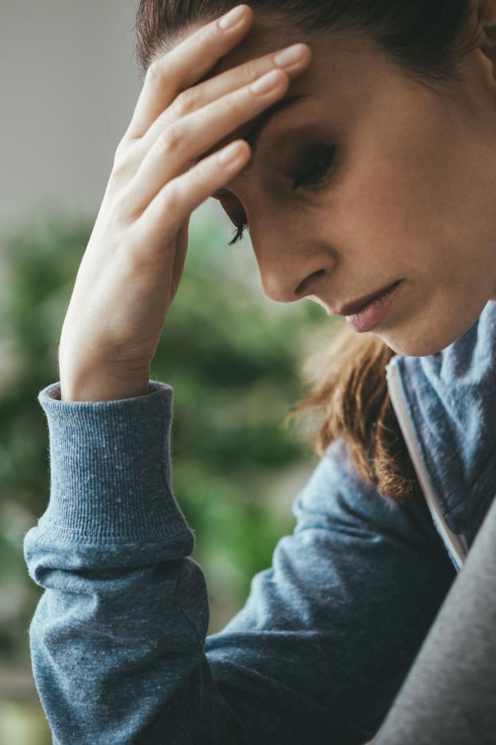 Depressed woman at home