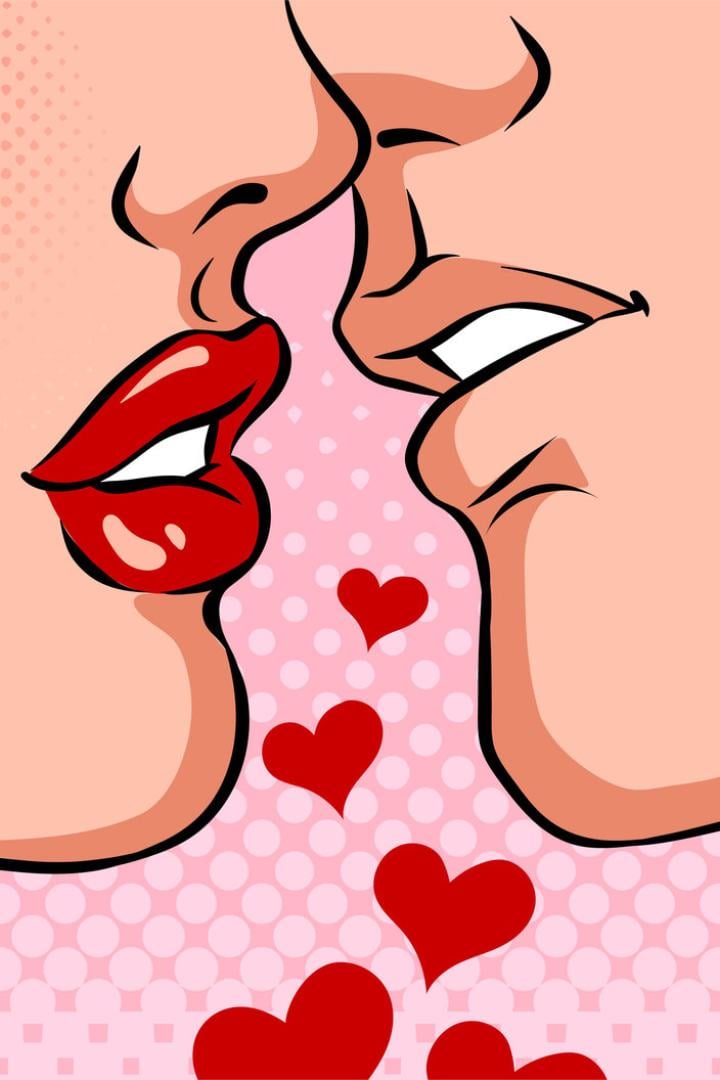 Ein Paar küsst sich vor einem Hintergrund mit roten Herzen.