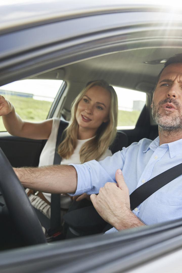 Caucasian of middle age couple during a car trip