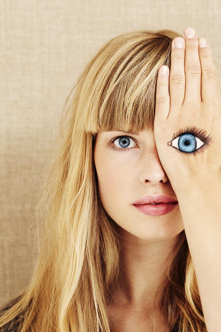 Beautiful blond with painted eye