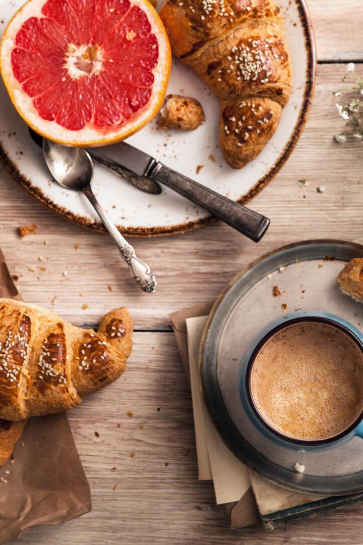 Breakfast with coffee and croissant