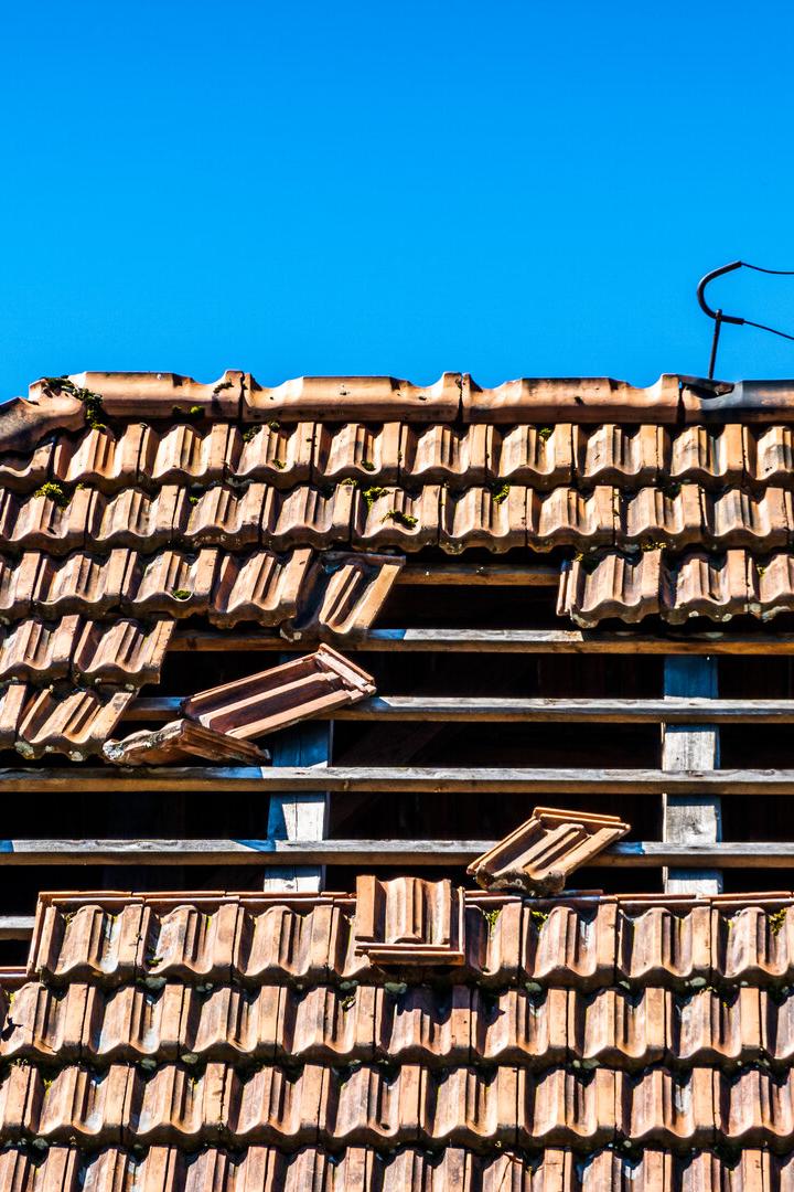damaged roof at an old house