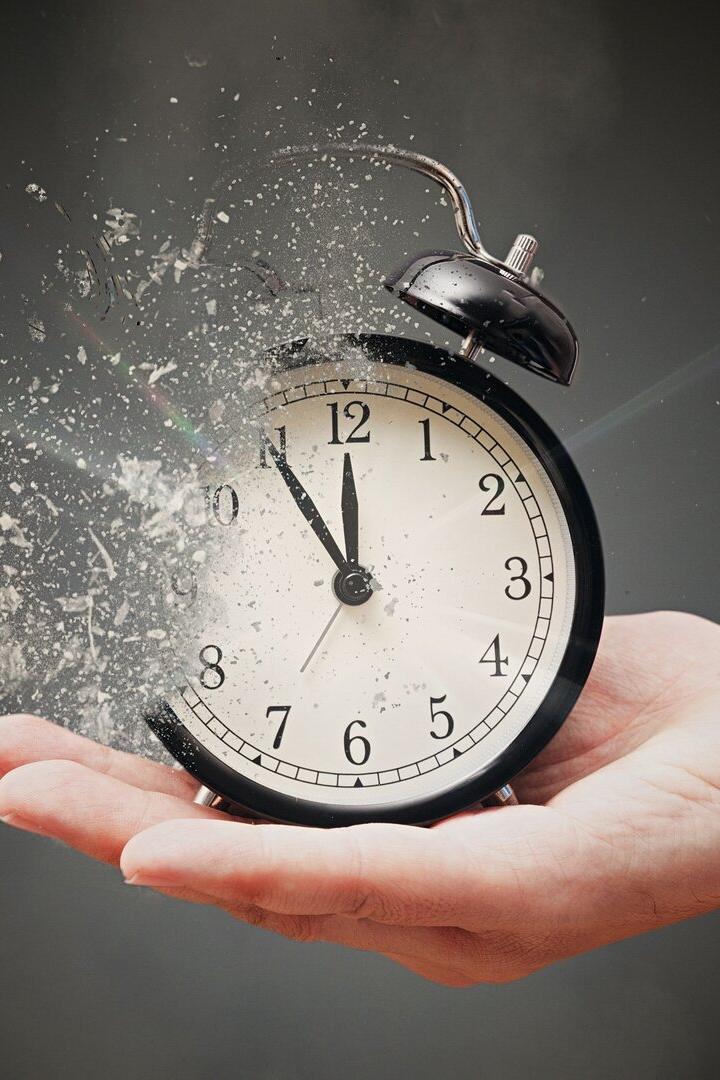Concept of passing away, the clock breaks down into pieces