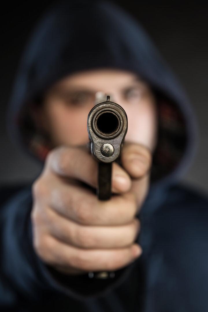 killer with gun
