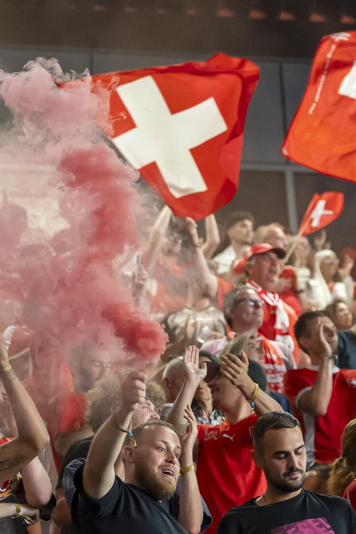 Swiss supporters watch the Switzerland vs Colombia