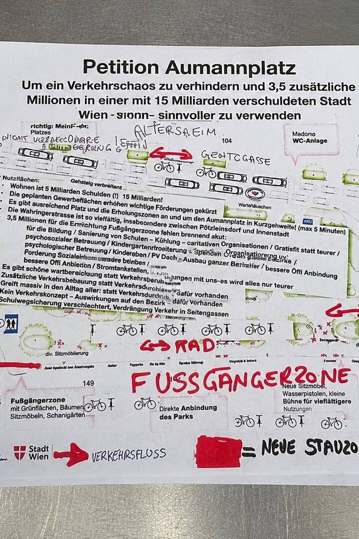 Markierte Petitionsgrafik zu Aumannplatz in Wien mit Verkehrsplan und handschriftlichen Anmerkungen.