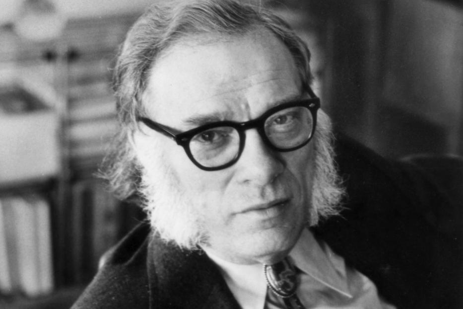 Schwarzweißporträt von Isaac Asimov mit Brille und Knebelbart.