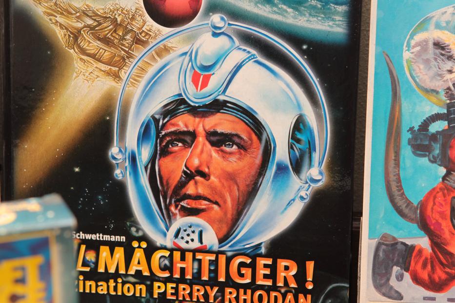 Das Cover eines Perry Rhodan Romans mit einem Mann im Raumanzug.