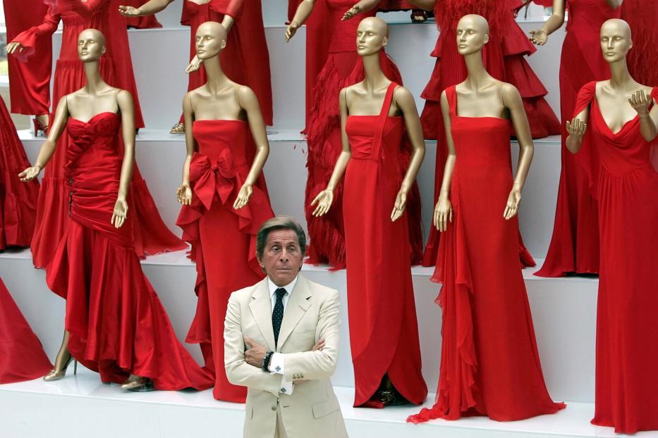 FILE PHOTO: Veteran Italian fashion designer Valentino Garavani poses during the opening of his exhibition at the Ara Pacis Museum in Rome