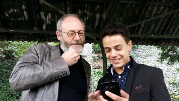 Games of Thrones star Liam Cunningham smiles toget