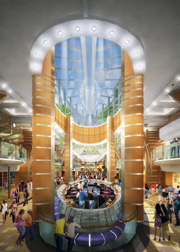 Das Innere eines großen Gebäudes mit mehreren Etagen und einer Band, die im Erdgeschoss spielt.