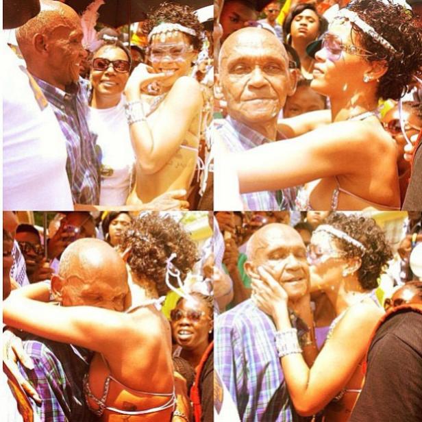 Rihanna umarmt und küsst einen älteren Mann während einer Karnevalsfeier.