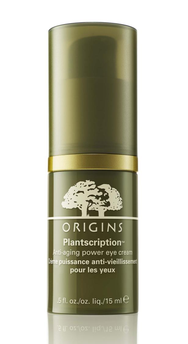 Eine Tube „Origins Plantscription“ Anti-Aging-Augencreme in Grün und Gold.