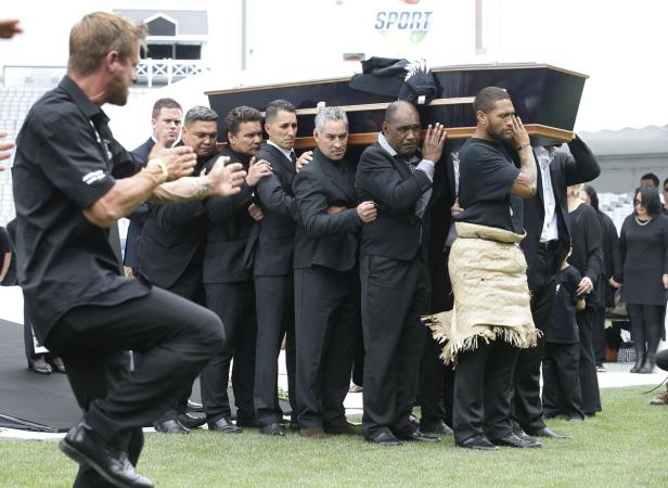 Former All Black Jonah Lomu's casket is carried ou