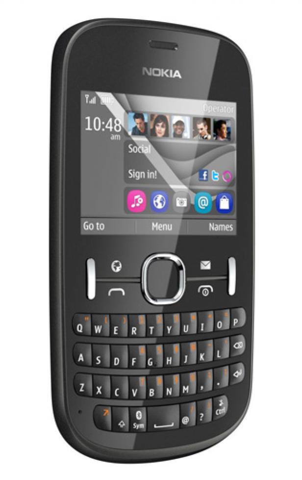 Ein schwarzes Nokia-Handy mit QWERTZ-Tastatur zeigt den Startbildschirm.