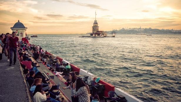 View at Maiden's tower in Istanbul at sunset, peop…