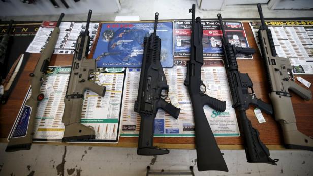 Guns for sale are seen on display in Roseburg Gun