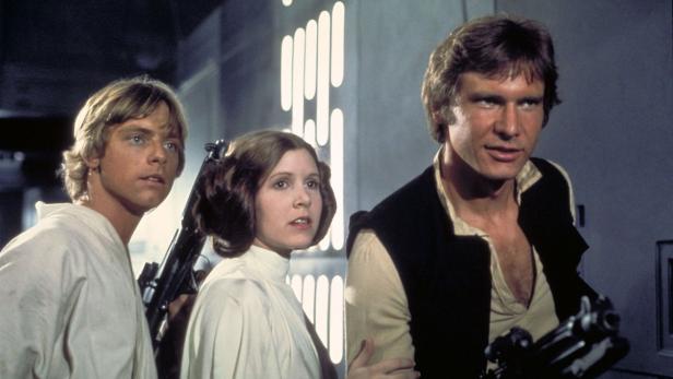 Luke Skywalker, Prinzessin Leia und Han Solo in einer Szene aus „Star Wars“.