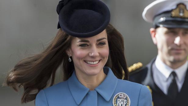 Britain's Catherine, Duchess of Cambridge walks to
