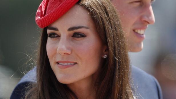 Britain's Prince William and his wife Catherine, t