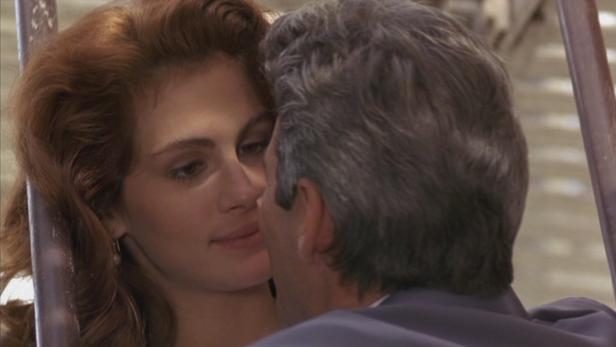 Julia Roberts und Richard Gere kurz vor einem Kuss in „Pretty Woman“.