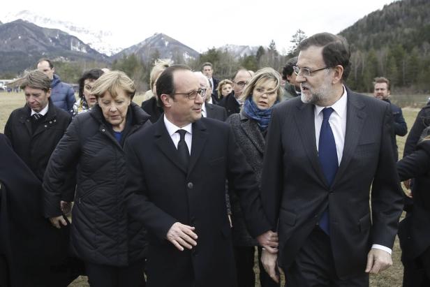 Angela Merkel, François Hollande und Mariano Rajoy gehen zusammen in den Bergen.
