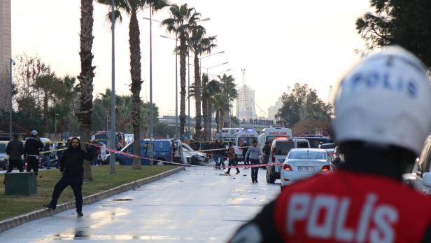 Police secure the area after an explosion outside