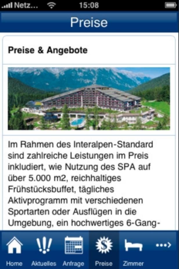 Interalpen Hotel Tyrol/iPhone-App/Liquid Air Lab Das Interalpen-Hotel Tyrol vor einer Bergkulisse, aufgenommen von einem Smartphone.