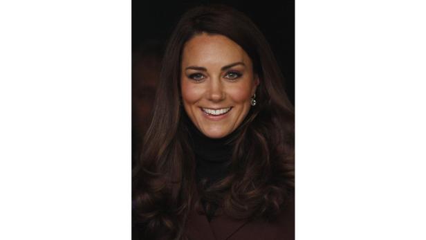 Ein Porträt von Catherine, Princess of Wales, lächelnd in die Kamera.