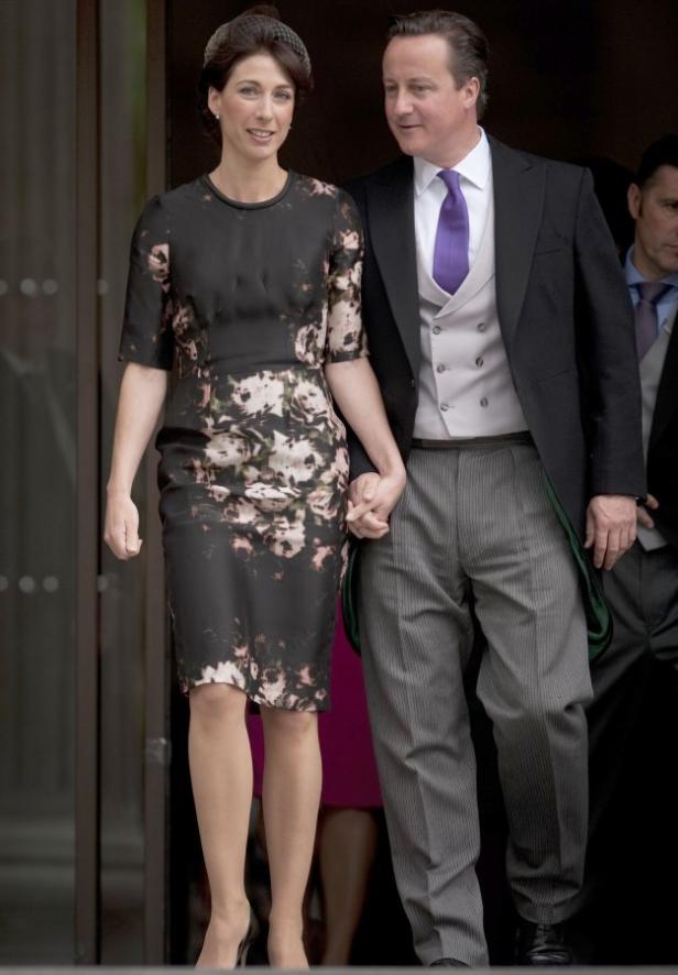 David Cameron und seine Frau Samantha Händchen haltend.
