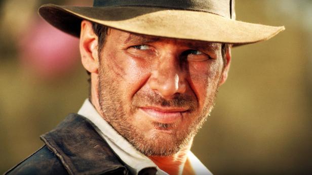 Harrison Ford als Indiana Jones mit Hut und Peitschennarbe im Gesicht.