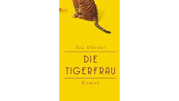Das Cover des Romans „Die Tigerfrau“ von Téa Obreht mit einem Tiger im oberen Bereich.