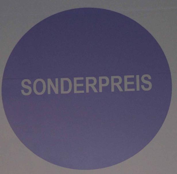 Ein lila Kreis mit der Aufschrift „Sonderpreis“.