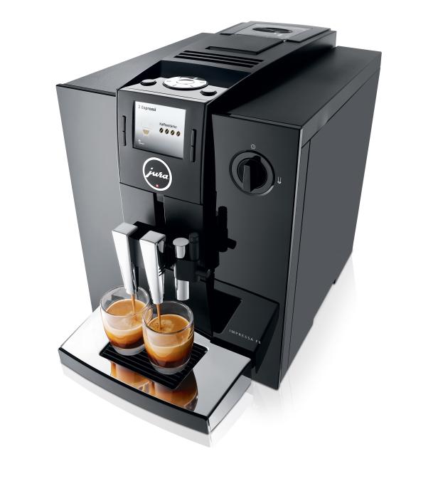 Ein Jura Impressa F8 Kaffeevollautomat bereitet zwei Espressi zu.