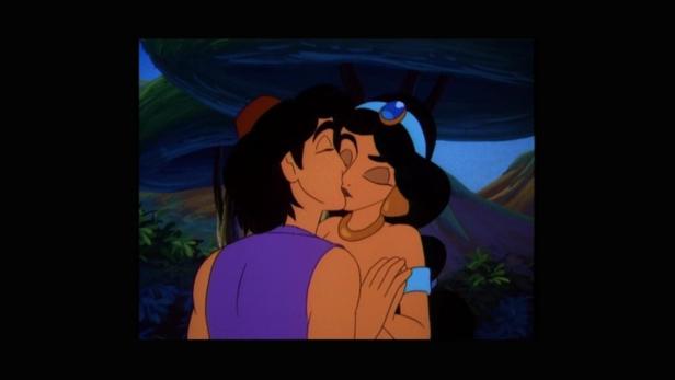 Aladdin und Jasmin küssen sich in einer Szene aus dem Zeichentrickfilm „Aladdin“.