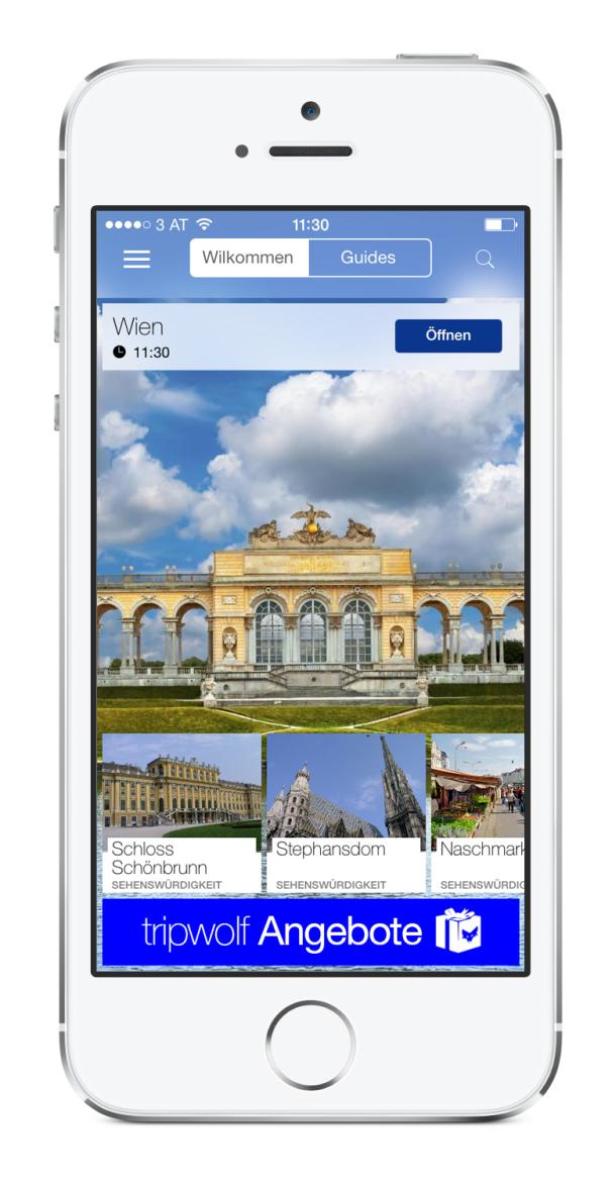 Ein Smartphone zeigt die Tripwolf-App mit Sehenswürdigkeiten in Wien, darunter Schloss Schönbrunn und Stephansdom.