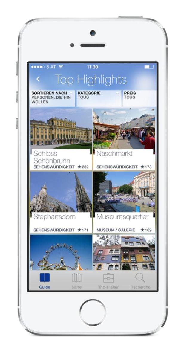 Ein iPhone zeigt eine App mit Top-Highlights von Wien, darunter Schloss Schönbrunn und der Stephansdom.