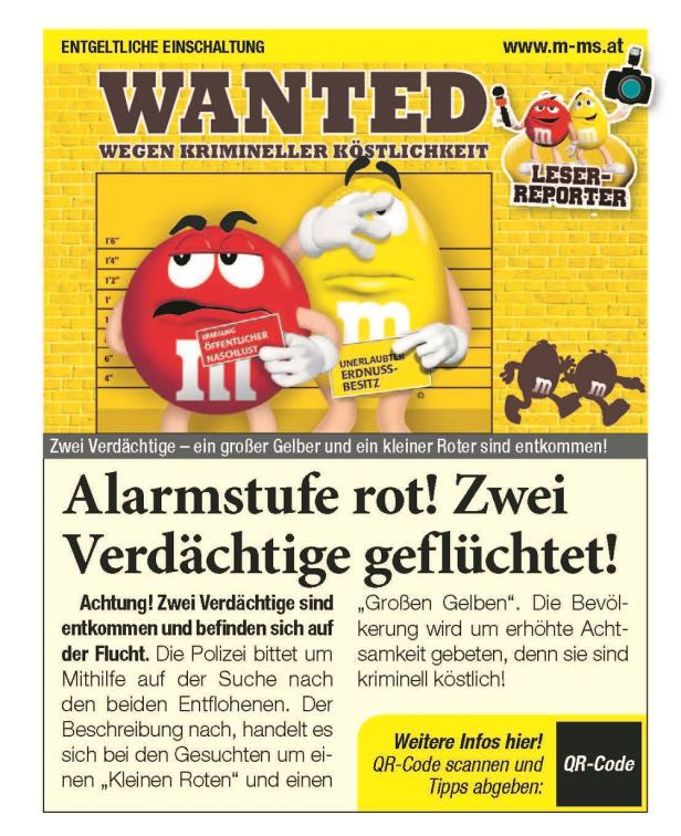 Ein „Wanted“-Plakat mit den M&Ms-Figuren Rot und Gelb als Verdächtige.