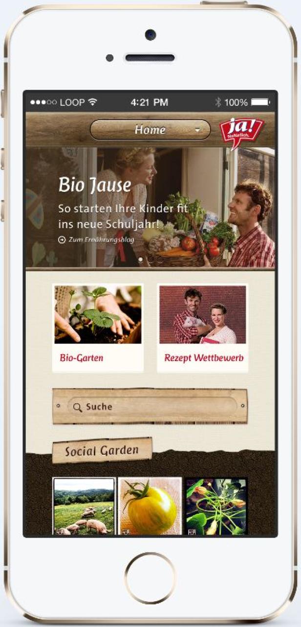 Ein iPhone zeigt eine Webseite mit dem Titel „Bio Jause“ und verschiedenen Garten- und Rezept-bezogenen Inhalten.