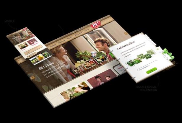 Die Website „Bio Jause“ wird auf verschiedenen Geräten dargestellt, darunter ein Smartphone und ein Tablet.