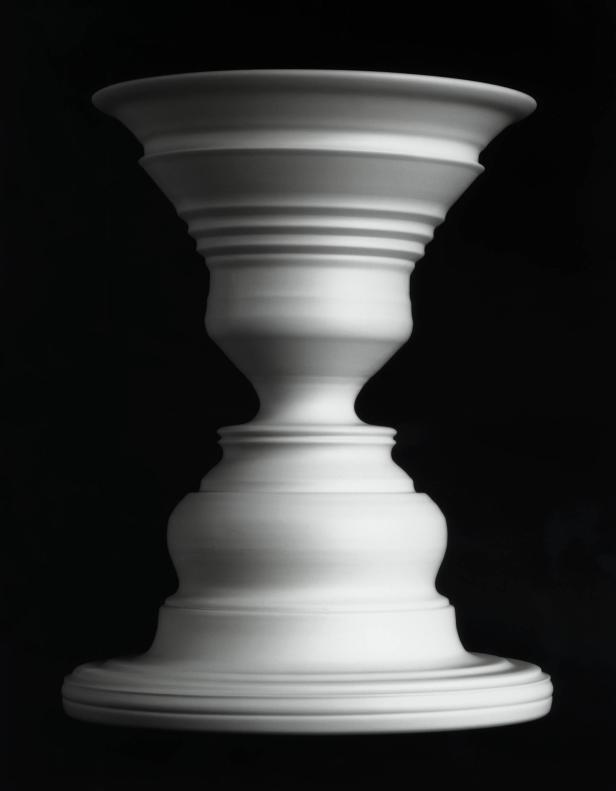Die Rubin-Vase, ein optische Täuschung, die entweder eine Vase oder zwei Gesichter im Profil zeigt.