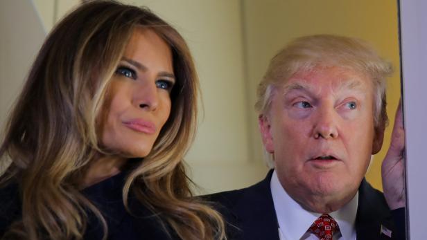 U.S. President Donald Trump talks to journalist me