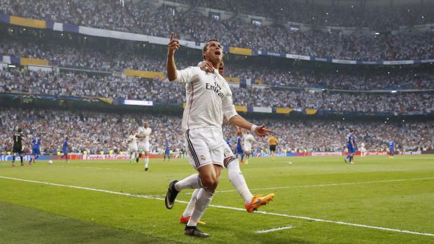 Cristiano Ronaldo feiert ein Tor im Trikot von Real Madrid.