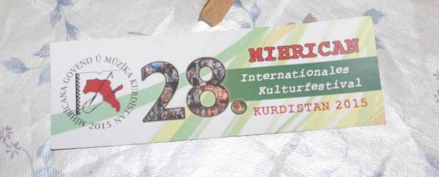 Ein Flyer für das 28. Internationale Kulturfestival Mihrican Kurdistan 2015.