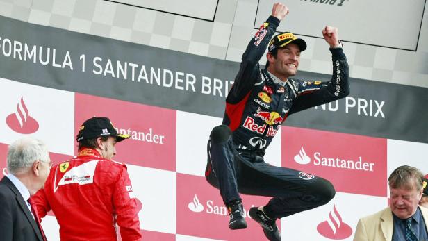 Mark Webber jubelt auf dem Podium beim Formel-1-Grand-Prix von Großbritannien.