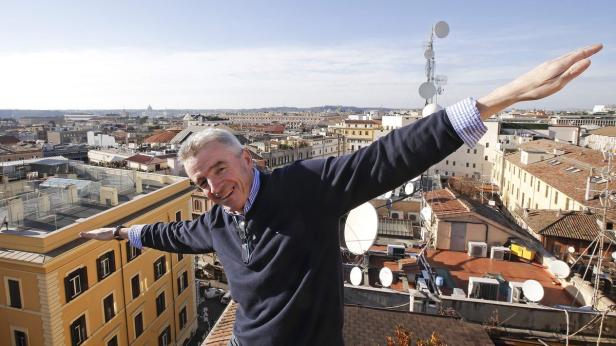 Ryanair CEO Michael O'Leary poses following a news