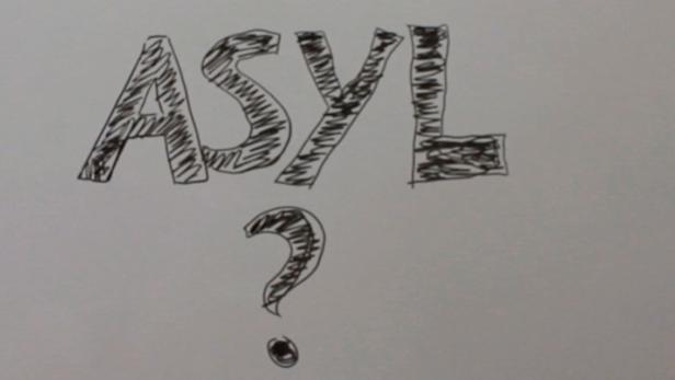 Die handgezeichnete Aufschrift „ASYL?“ auf einem Blatt Papier.