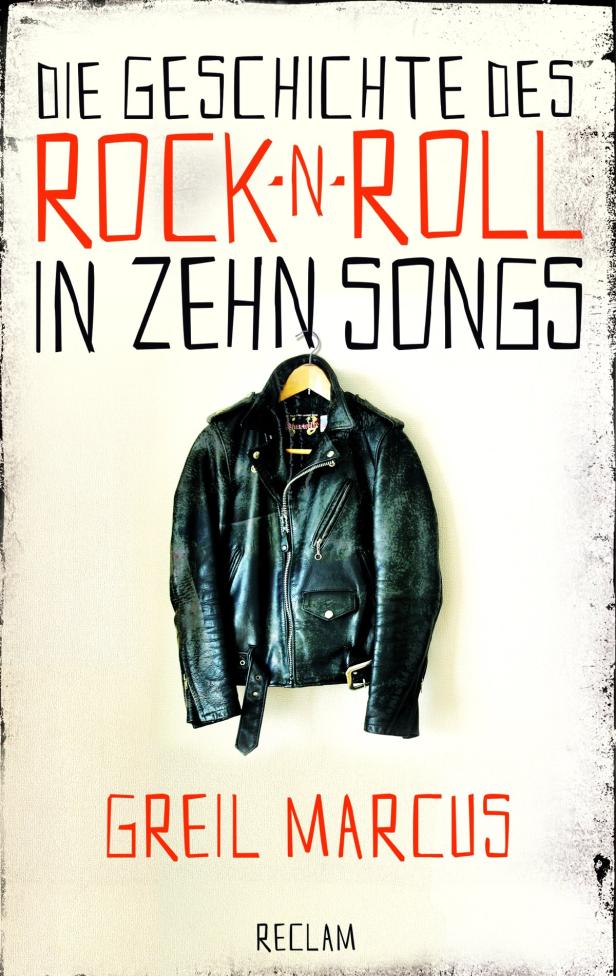 Das Buch „Die Geschichte des Rock 'n' Roll in zehn Songs“ von Greil Marcus mit einer Lederjacke.